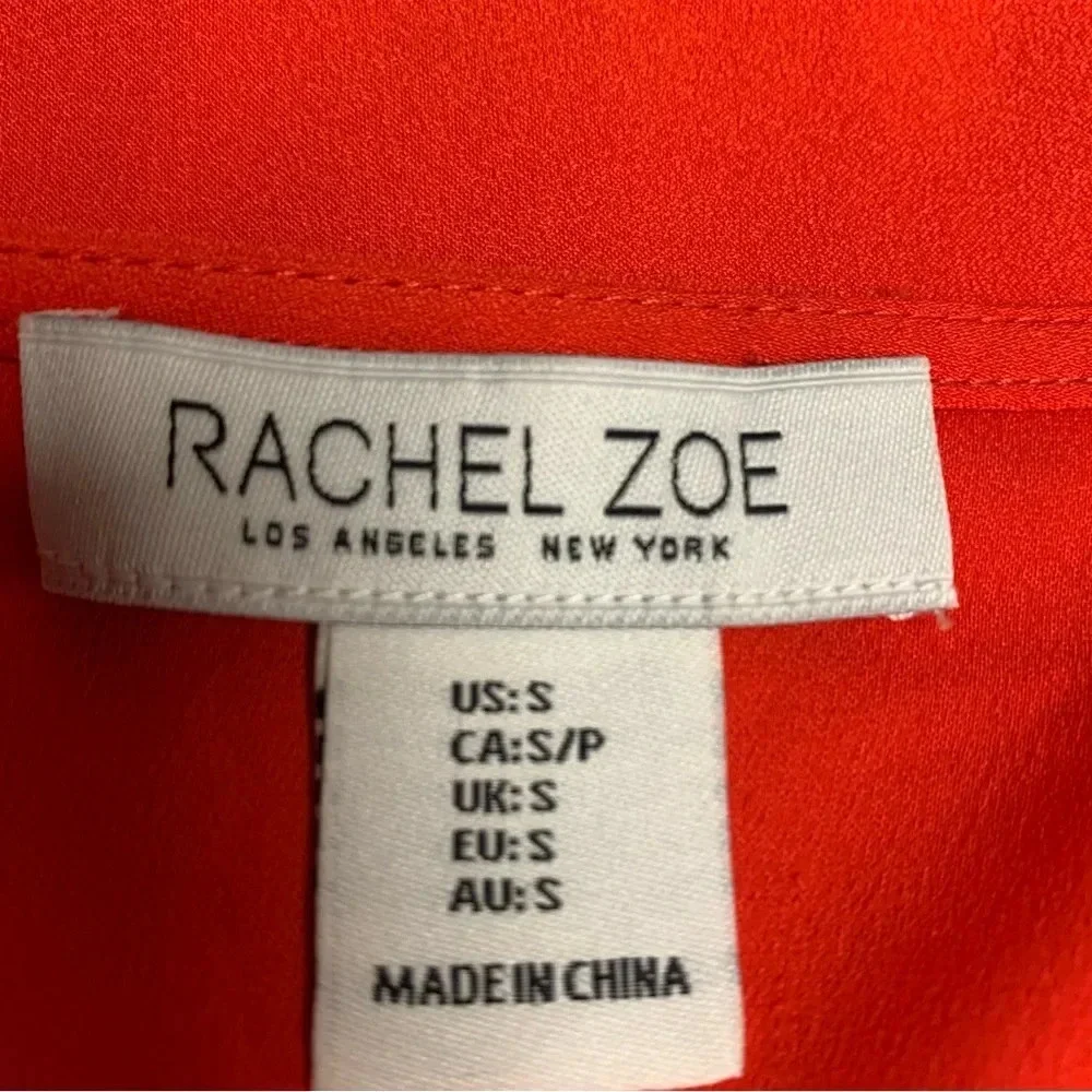 Rachel Zoe bright orange blouse size Small bold seam down the front